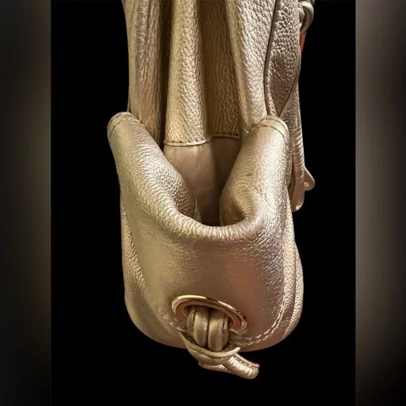 Michael Kors Metallic Gold Leather Drawstring Shoulder Bag. - Picture 4 of 16